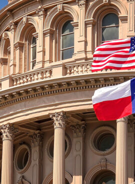 American and Texas Flag Flying, Texas State Capitol in Austin